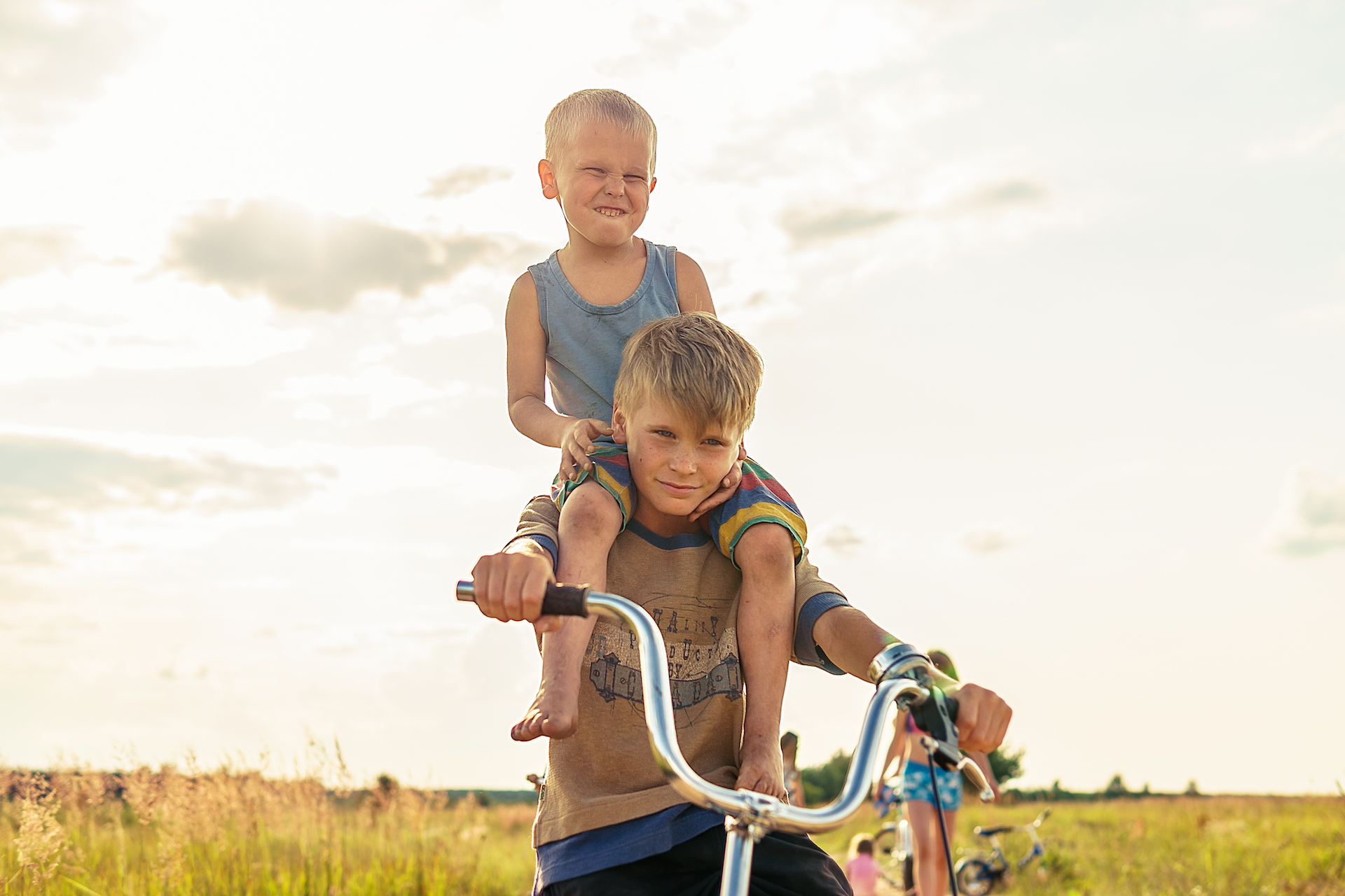 Cycling week: Kids riding on bicycles example photo